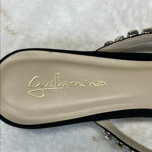 Anthropologie Brown and Black Flats with Animal Print