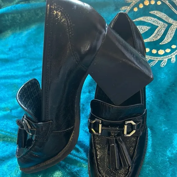 ANTONIO MELANI Black Flats with Tassel and Metallic Accents