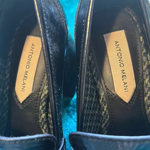 ANTONIO MELANI Black Flats with Tassel and Metallic Accents
