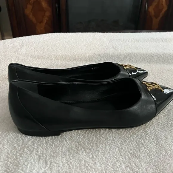Louis Vuitton Black Flats with Gold Logo