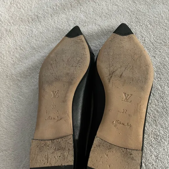 Louis Vuitton Black Flats with Gold Logo
