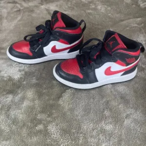 Nike Black and Red Air Jordan's