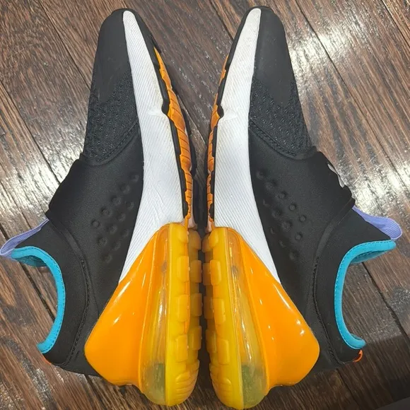 Nike Kids Black and Orange Slip-On Shoes