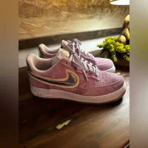 Nike Women's Pink and Silver Sneakers