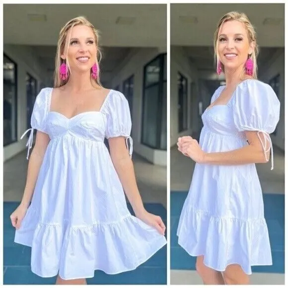 Olivaceous Lola Babydoll Dress in white size Medium