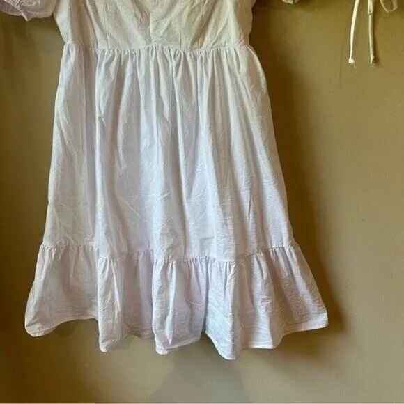 Olivaceous Lola Babydoll Dress in white size Medium