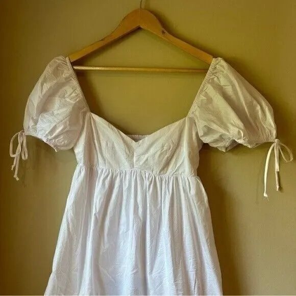 Olivaceous Lola Babydoll Dress in white size Medium