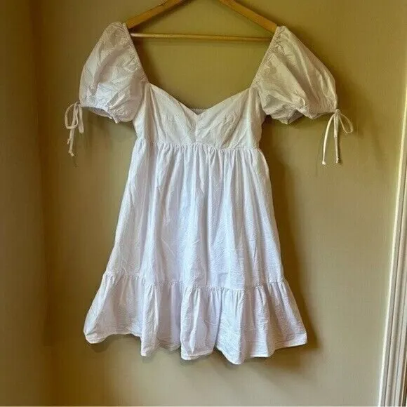 Olivaceous Lola Babydoll Dress in white size Medium