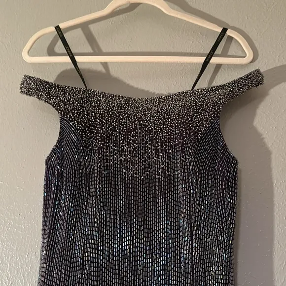 Purple, fully beaded, off the shoulder, formal gown by Jovani