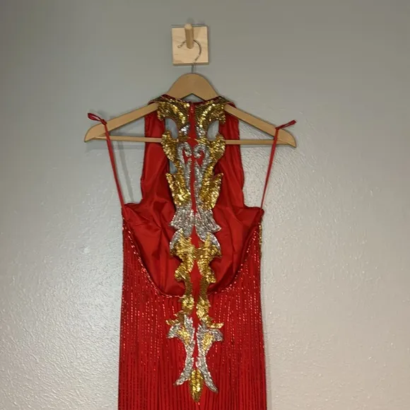 Red, silver and gold formal gown dripping in beads and sequins by Sterling