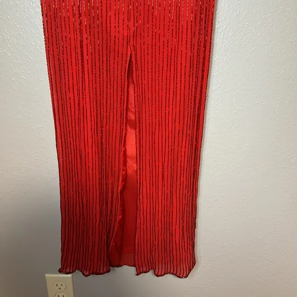 Red, silver and gold formal gown dripping in beads and sequins by Sterling