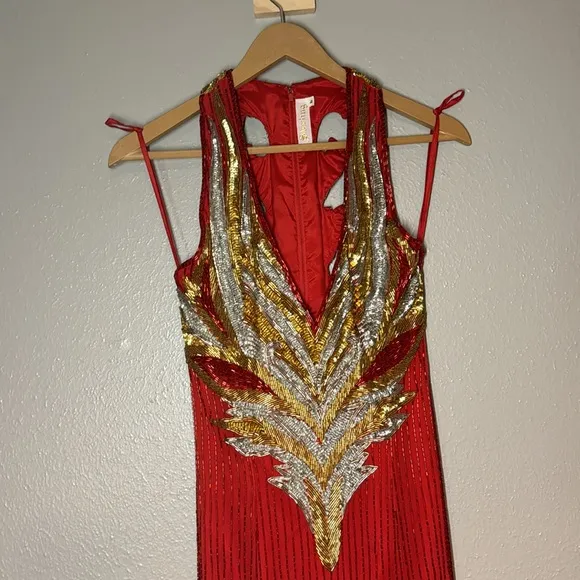 Red, silver and gold formal gown dripping in beads and sequins by Sterling