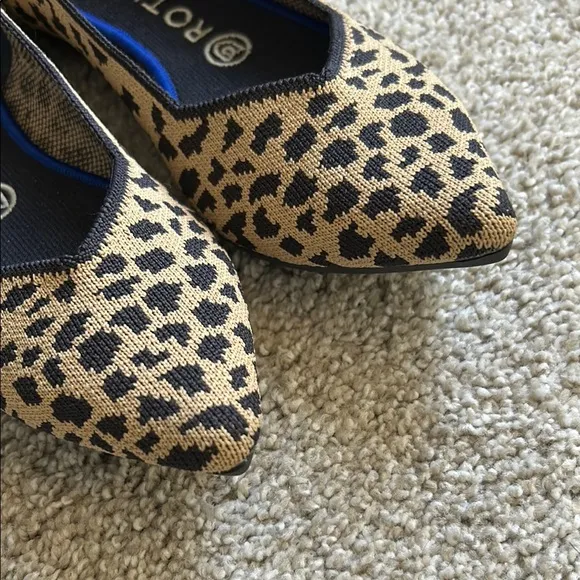 Rothy's Brown and Black Flats with Animal Print