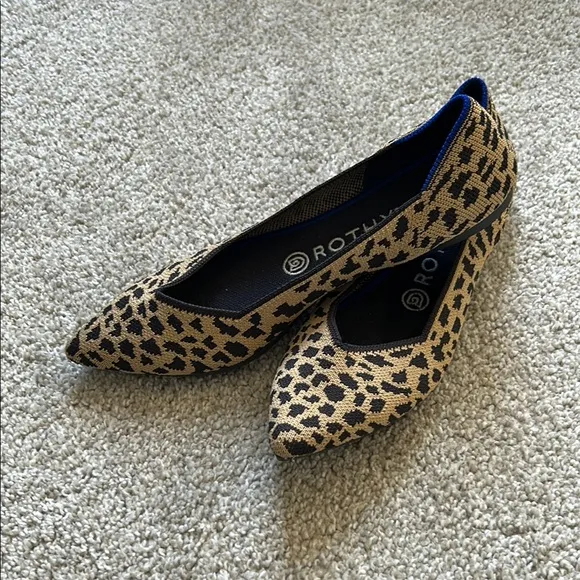 Rothy's Brown and Black Flats with Animal Print