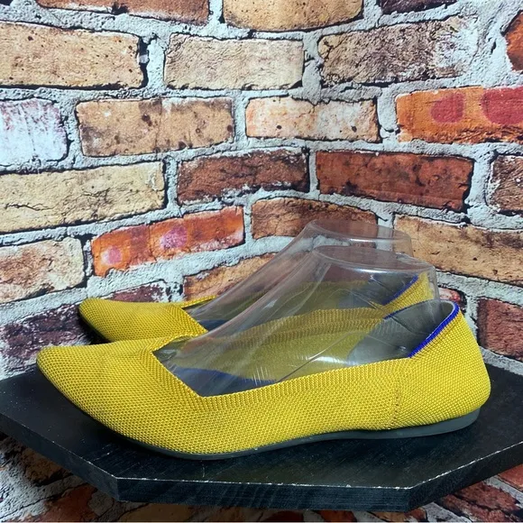 Rothy’s pointed yellow flats
