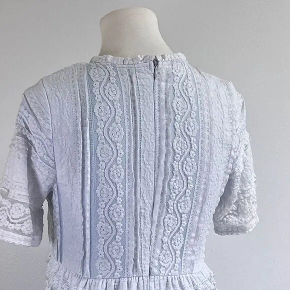 Saving Paige Floral lace short sleeved dress, sz small. Light blue white tiered