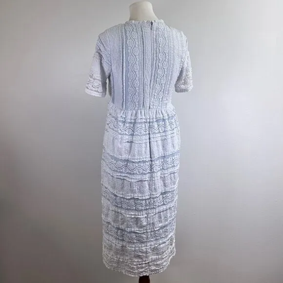 Saving Paige Floral lace short sleeved dress, sz small. Light blue white tiered
