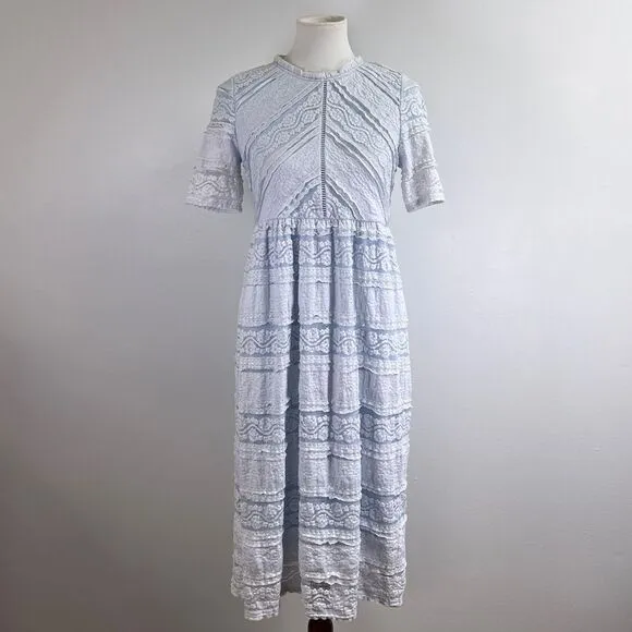 Saving Paige Floral lace short sleeved dress, sz small. Light blue white tiered