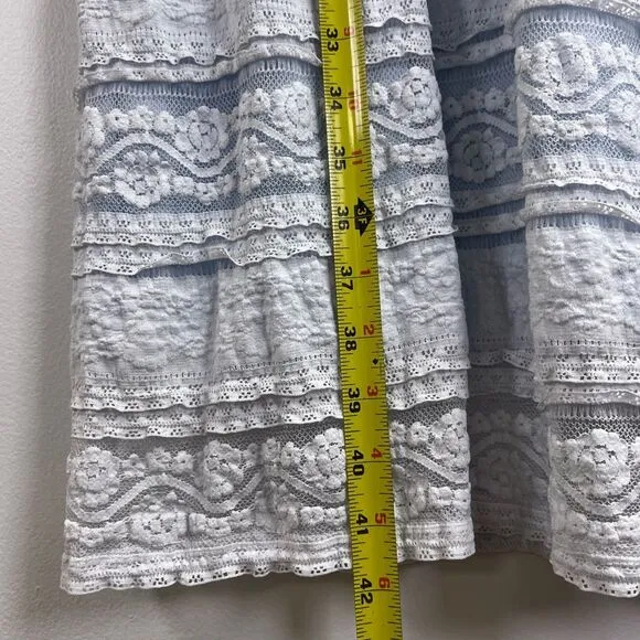 Saving Paige Floral lace short sleeved dress, sz small. Light blue white tiered