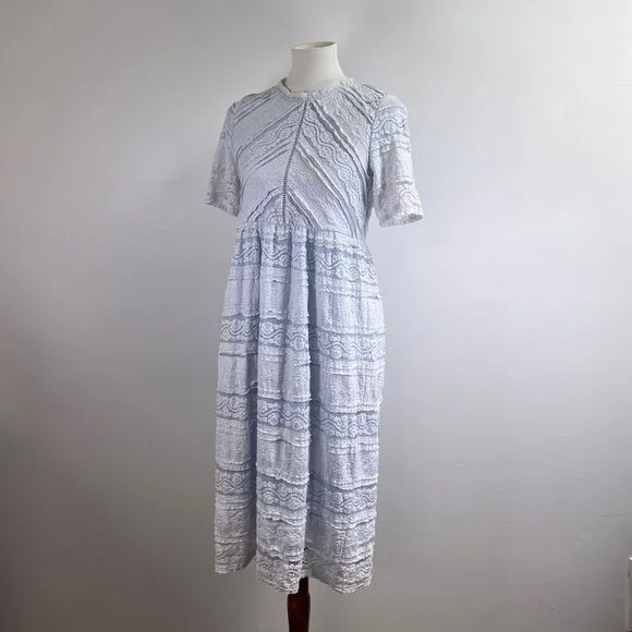 Saving Paige Floral lace short sleeved dress, sz small. Light blue white tiered