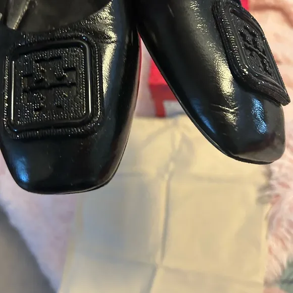 Tory Burch Black Flats with Embossed Logo and Glossy Finish