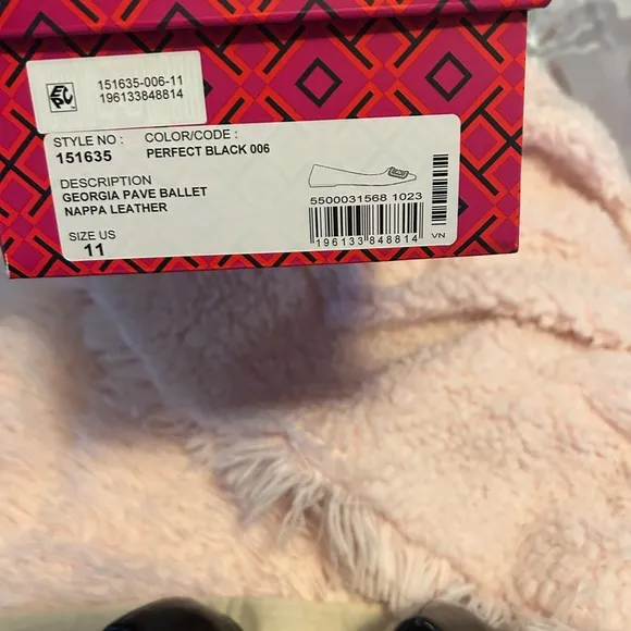 Tory Burch Black Flats with Embossed Logo and Glossy Finish